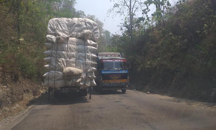 Truck carrying over East West Highway Nepal.jpg