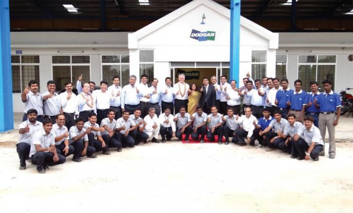 Staff outside the new Doosan facility in India 